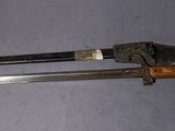 a knife and a knife holder on a table