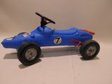 a blue toy car with a steering on a white surface