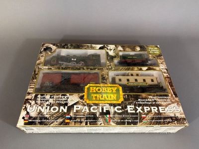 a box with a train set on it on a table