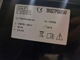 a close up of a train ticket on the back of a car