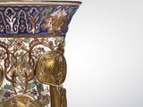 a vase that is sitting on a table in a room