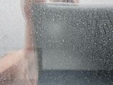a man taking a picture of himself in the shower