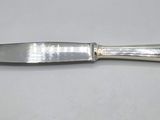 a knife that is sitting on a table