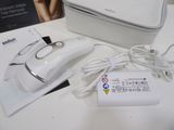a white bag and a white mouse on a table