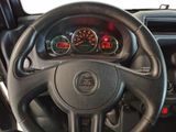 dashboard of a car with a steering wheel and gauges on it