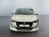 the front view of a white car in a showroom