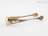 pair of antique silverware spoons on a white background