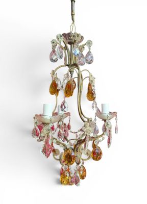 an image of a chandelier hanging from a ceiling