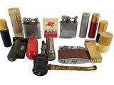 many different types of lighters and lighters on the table