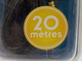 a package of 20 meters of black cord in the package