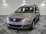 a silver car that is parked on a checkered floor