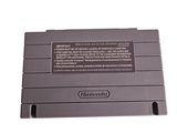 a nintendo game console sitting on top of a white surface