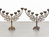pair of antique brass candelabs with ornate designs