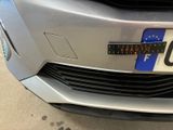 a close up of a car with a number plate on it