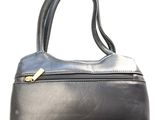 black leather handbag on white background with clipping for text