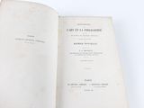 a book open on a table with a white background