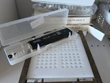 a box that has a remote on top of it