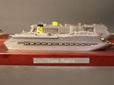 a model of a cruise ship on display on a table