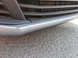 a close up of the front bumper of a car