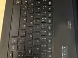a close up of a laptop keyboard on a table