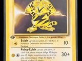 a close up of a pokemon card on a black background