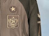 a jacket that has a star on it