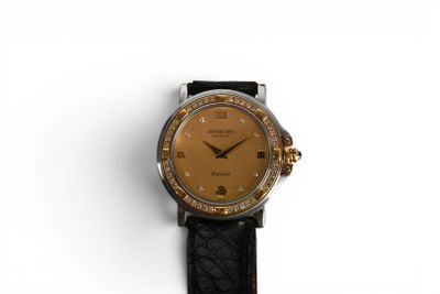 an image of a close up of a wrist watch on a white surface