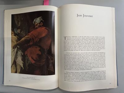 an open book with a picture of a man and a woman on it