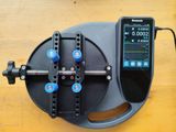 a small device that is connected to a device on a table