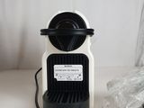 a coffee maker that is sitting on a table