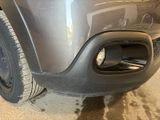 a close up of the front bumper of a car