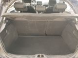 a trunk of a car with the back seats folded down