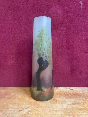 a glass vase with a picture of a bear on it