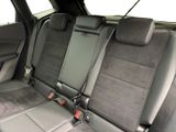 two seats in the back of a car that are empty