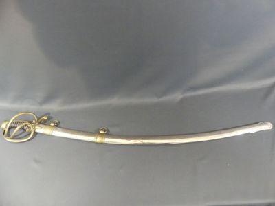 an image of a sword that is on a table