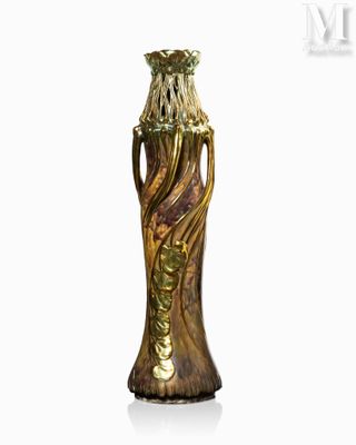 a vase that is sitting on a white surface
