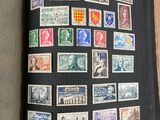 a book with a bunch of stamps on it