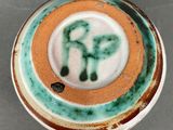 a close up of a cup on a table