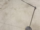 an image of a floor lamp on a concrete floor in a room