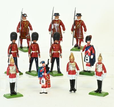 a lot of toy soldiers that are standing in a line