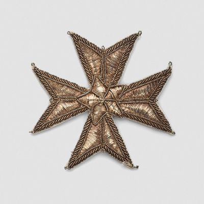 an image of a cross made out of metal