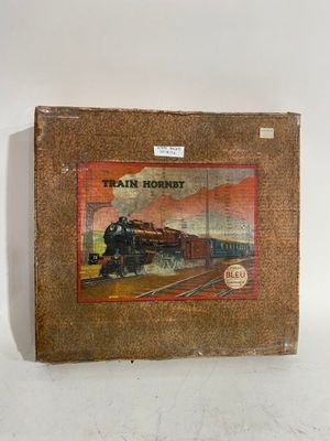 une image représentant une image d'un train sur la couverture d'un livre