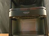two toasters stacked on top of each other on a table