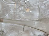 a lot of empty glass bottles in a box