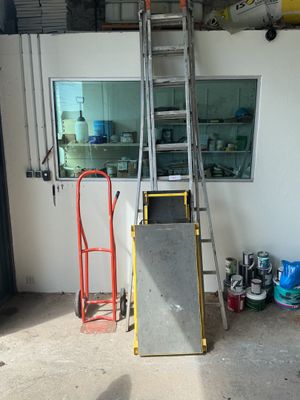 a ladder leaning against a wall in a garage