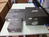 several boxes of electronics on a table in a store