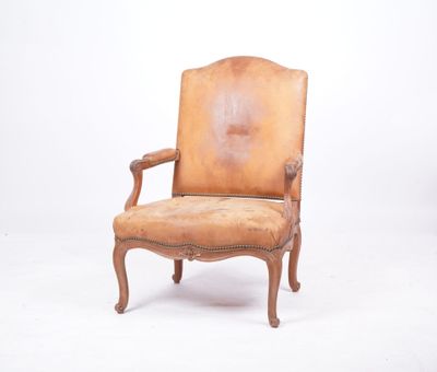 an image of a brown leather chair on a white background