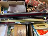 a box full of assorted items sitting on top of a table