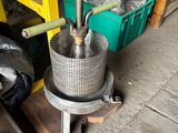 an image of a machine that is sitting in a garage