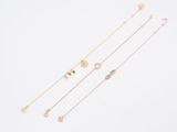 a set of five gold and diamond necklaces